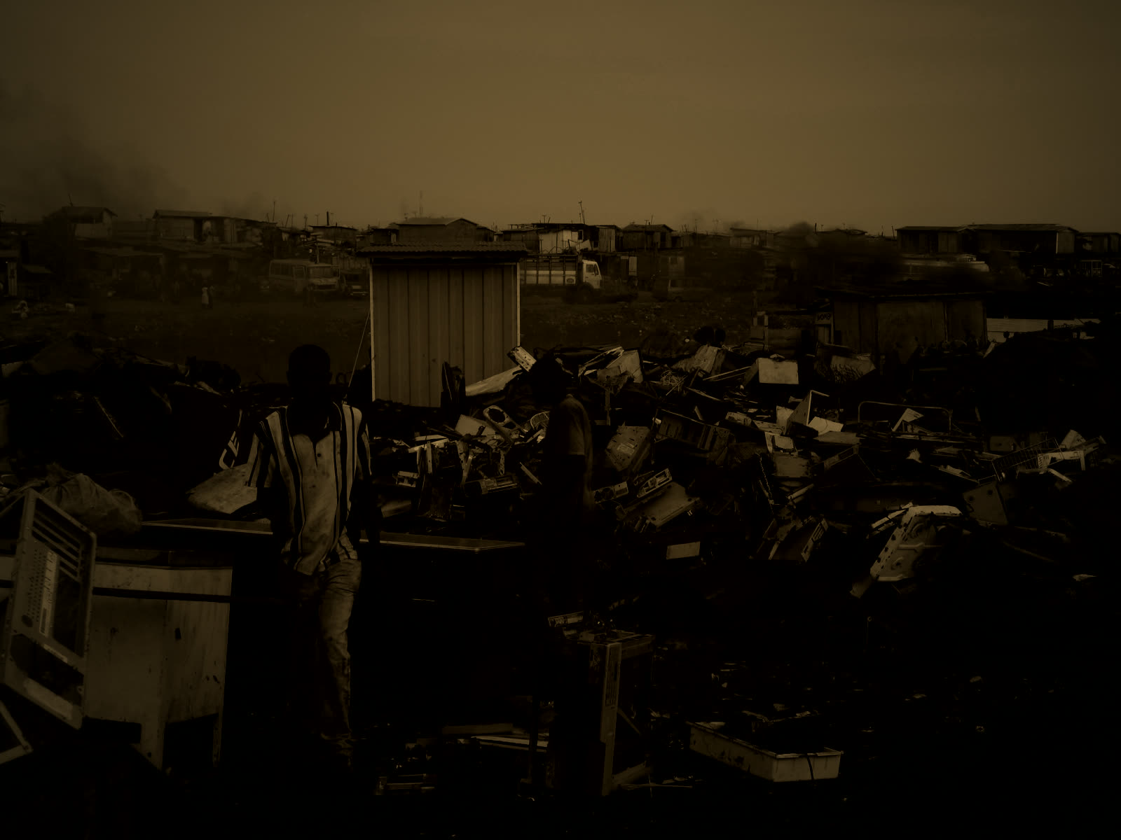Workers salvaging metal from electronic waste, Agbogbloshie, Accra